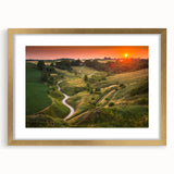 Abstract art print of a European scenery in muted gold and blue tones, framed with a gold mat, ideal for dining room decor.