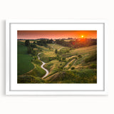 Textured art depicting an abstract European scenery in muted earth tones on a framed white mat, ideal for bedroom wall decor.