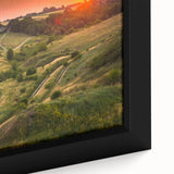 Close-up of textured black wall art depicting a colorful European cityscape on a framed canvas, ideal for living room decor.