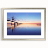 Extra large abstract art print of Lisbon scenery in textured style, with muted earth tones on a silver-framed mat.