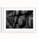 Textured abstract art print of Porto's cityscape in muted earth tones, framed with a white mat, ideal for bedroom wall decor.