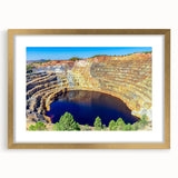 Textured abstract art print of Andalucia scenery in muted earth tones, framed in gold, ideal for bedroom art.