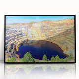 Large abstract wall art depicting Andalusian scenery in muted earth tones, framed in black acrylic.