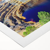 Art deco poster of Andalucia scenery in muted earth tones on rolled canvas, suited for dining room wall art.