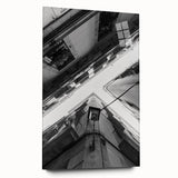 Large abstract wall art featuring a Barcelona cityscape in muted gray and blue tones on acrylic glass.