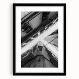 Colorful abstract art print of Barcelona scenery in vibrant hues on a large textured canvas, framed in black.