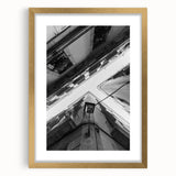 Abstract art print of Barcelona skyline in gold frame, featuring muted earth tones, ideal for dining room decor.