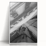 Mid-century modernist art depicting Barcelona skyline in muted gray on white framed acrylic, suitable for nursery wall art.