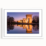 Abstract art print of Madrid skyline in muted gray and blue tones on a framed white mat, ideal for dining room decor.