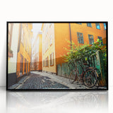 Large abstract wall art of Stockholm's skyline in muted gray and blue tones on a framed acrylic.