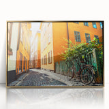 Large art print of Stockholm scenery in muted gold and blue tones on framed acrylic, ideal for modern nursery wall decor.