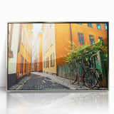 Mid-century modernist art of Stockholm skyline in muted blue and gray tones on a framed acrylic print.