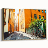 Framed canvas of a vintage Stockholm landscape in black and gold, ideal for bedroom wall art.