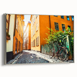 Landscape art painting of Stockholm featuring colorful buildings on canvas, framed in silver, ideal for living room decor.
