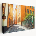 Side view of a stretched canvas depicting a serene Stockholm cityscape in muted blue and grey tones.
