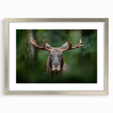 Textured abstract art print of a Scandinavian landscape in muted blue and gray, framed in silver, ideal for bedroom decor.