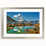 Textured abstract art print of a European scenery in Switzerland, featuring muted earth tones on a framed silver mat.