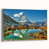 Framed canvas featuring a vintage-style landscape painting of a Swiss scenery in muted earth tones.