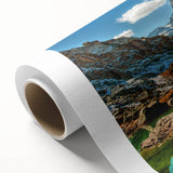 Art deco poster of a Swiss landscape on rolled canvas, featuring muted earth tones, ideal for nursery wall art.