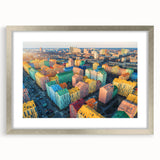 Textured abstract art print depicting a serene European landscape in muted earth tones, framed with a silver mat.