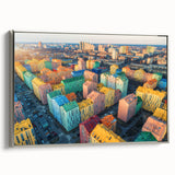 Framed canvas depicting a colorful European landscape with vintage poster art style, ideal for enhancing black wall decor.