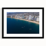 Extra large, colorful abstract art print of Acapulco scenery on textured canvas, framed in black.