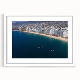 Abstract art print of Acapulco scenery in a white frame with mat, using vibrant blue and green tones.