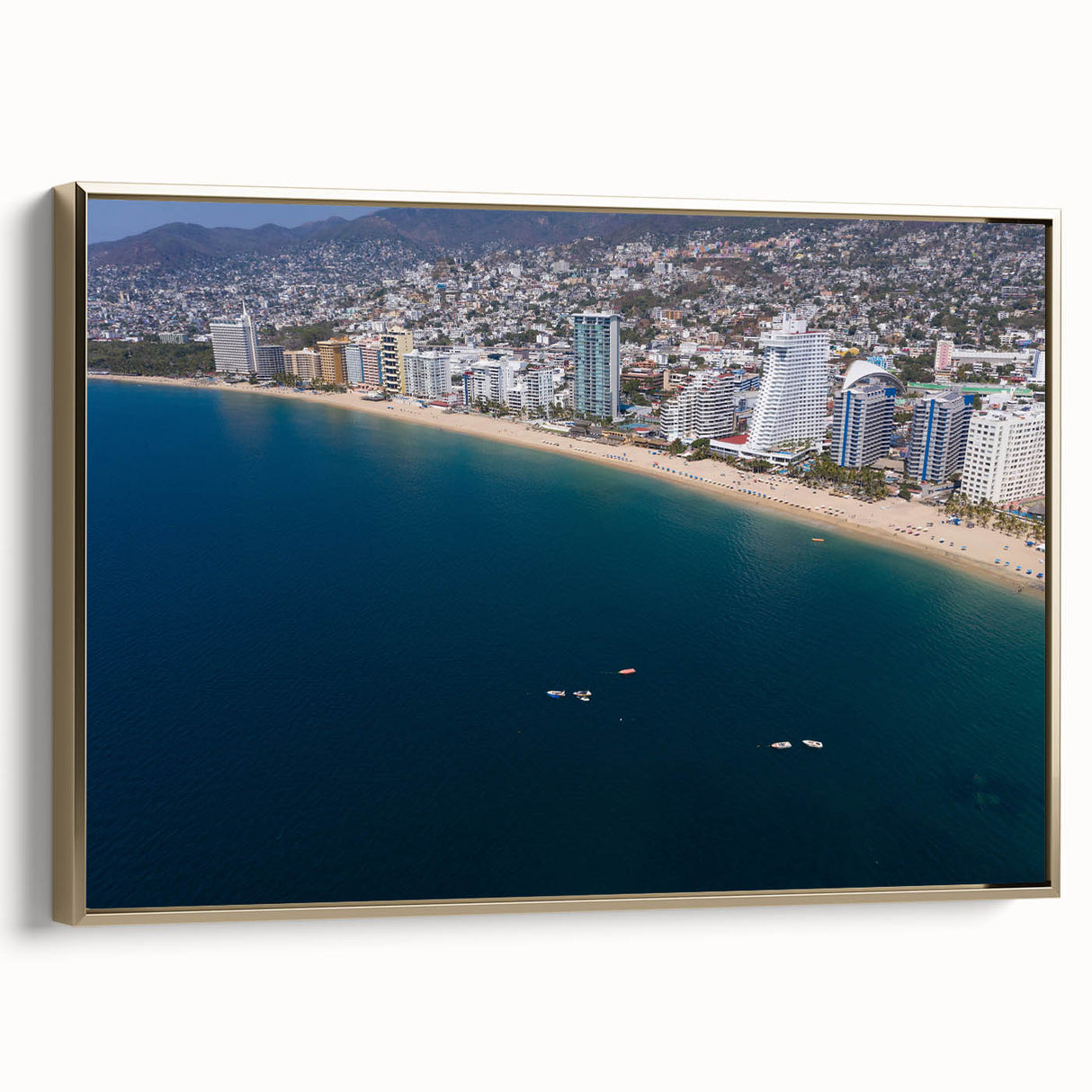 Framed canvas of vintage-style Acapulco landscape with black and gold tones, ideal for bedroom wall art.