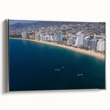 Framed canvas of vintage Acapulco landscape with colorful art and black accents, ideal for living room decor.