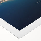 Art deco poster depicting the Acapulco skyline in muted pink and blue hues on rolled canvas, suitable for dining room decor.