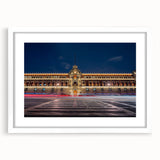 Abstract art print of Mexico City in muted gray and blue tones on a framed white mat, ideal for dining room decor.