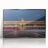 Framed acrylic print of Mexico City with silver mid-century modernist design in muted colors.