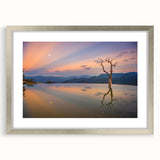 Textured abstract art print of Oaxaca scenery in muted earth tones, framed in silver, ideal for bedroom art.