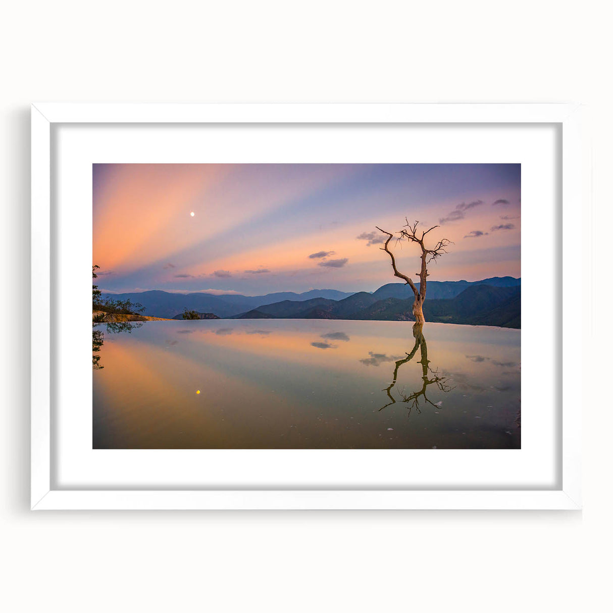 Abstract art print of Oaxaca scenery in muted earth tones on a framed white mat, suitable for bedroom or dining room decor.