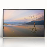 Mid-century modernist art depicting Oaxaca, Mexico scenery in muted earth tones on a silver-framed acrylic.