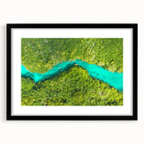Abstract art print featuring textured, colorful art of Quintana Roo scenery in a large black frame.