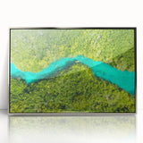 Mid-century modernist art of Quintana Roo scenery in silver-framed acrylic, showcasing vivid blue and green tones.