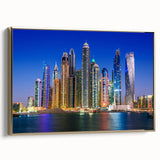 Framed canvas wall art depicting Dubai skyline in black and gold tones, ideal for bedroom decor.