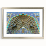 Textured abstract art print depicting a Middle Eastern scenery in muted earth tones on a framed silver mat.