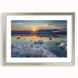 Textured art depicting the Dead Sea in muted blue and beige tones on a framed silver mat, suitable for bedroom art.