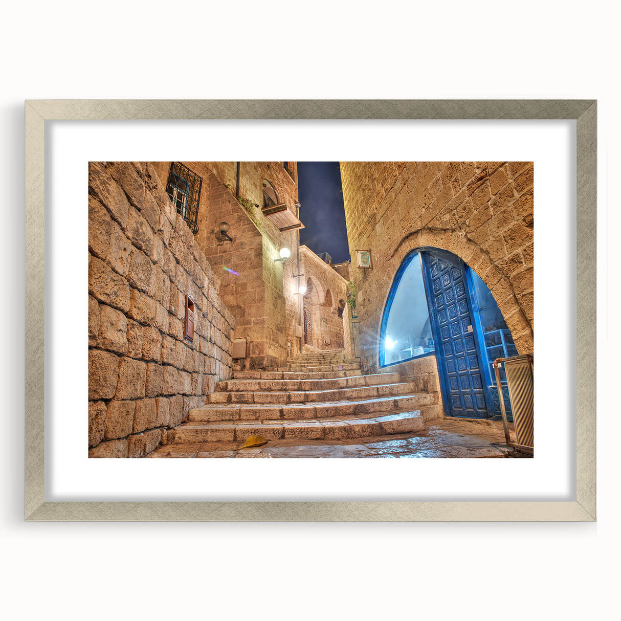 Textured abstract art print of Tel Aviv scenery in muted earth tones, framed in silver, ideal for bedroom art.