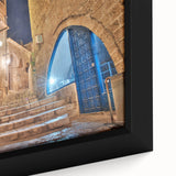 Extra large framed canvas of Tel Aviv skyline in textured black with colorful accents, ideal for living room decor.