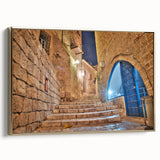 Framed canvas wall art of Tel Aviv landscape in vintage poster style, featuring black and gold tones.