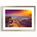 Textured abstract art print of a Middle Eastern scenery in muted earth tones, framed with a silver mat.