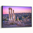 Black and white framed canvas featuring a vintage-style landscape painting of a Jordanian scene.