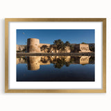Extra large wall art depicting an abstract Middle Eastern scenery in textured gold and earth tones.