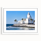 Abstract art print featuring a stylized Saudi Arabian landscape in muted earth tones, framed in white.