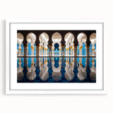 Abstract art print of Abu Dhabi skyline in muted gray and blue tones on a framed white mat.