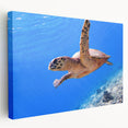 Side view of a stretched canvas depicting a serene Fiji beach scene with soft blue and sandy hues.