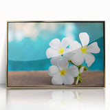 Large acrylic print of Bora Bora's serene waterscape in soft blue and green hues, framed in gold.